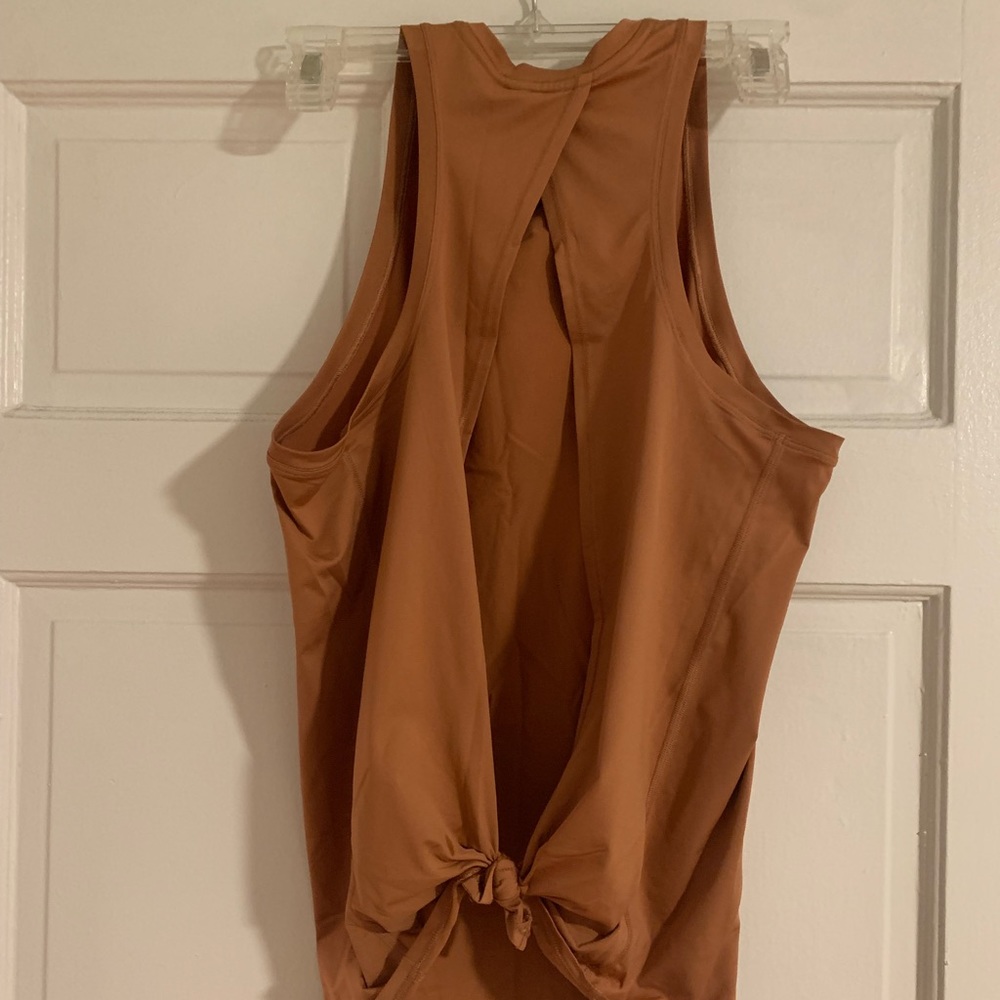Lululemon Size 4 All Tied Up Tank. EUC. In burnt orange color.